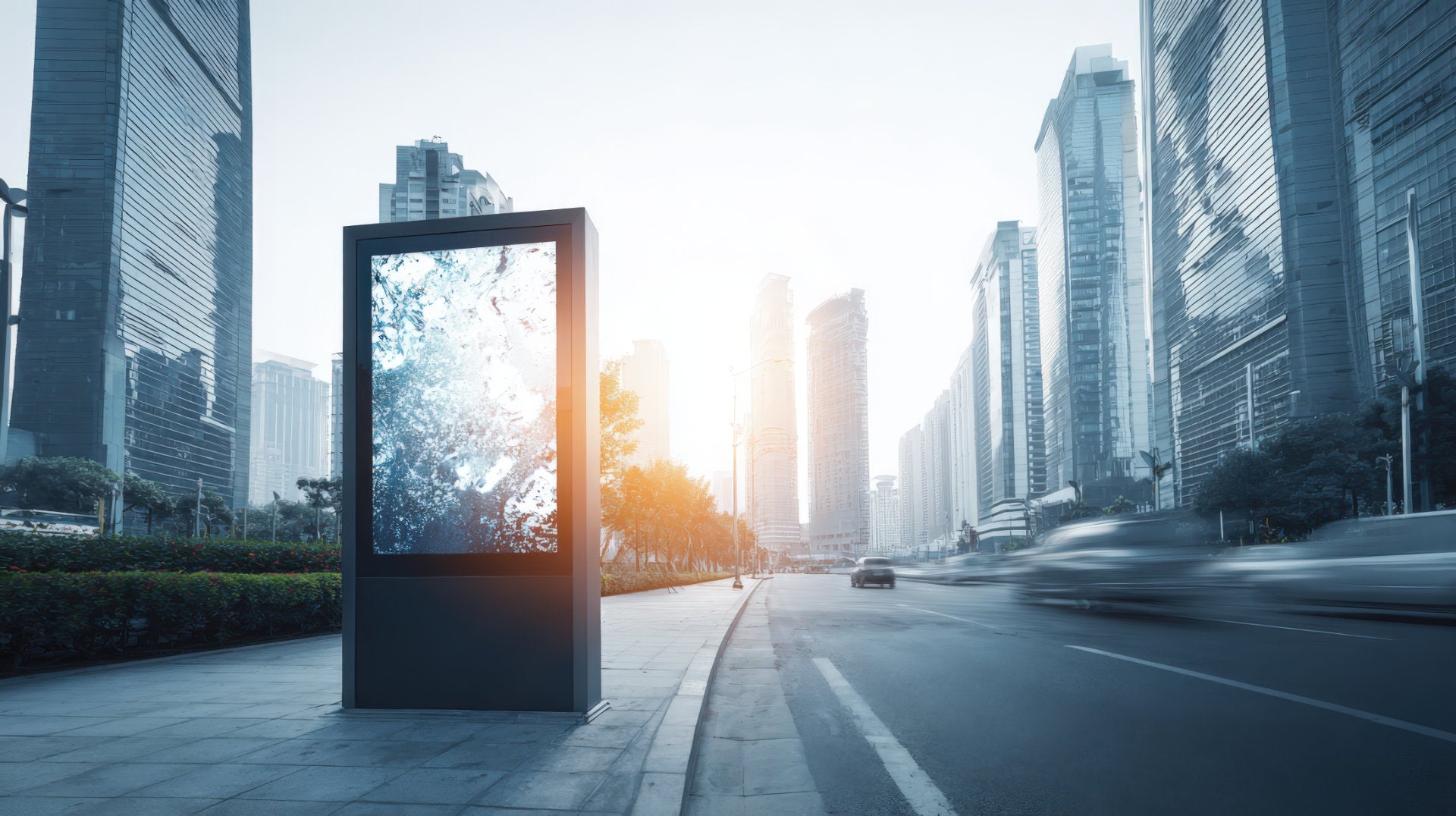City street with digital display and tall buildings